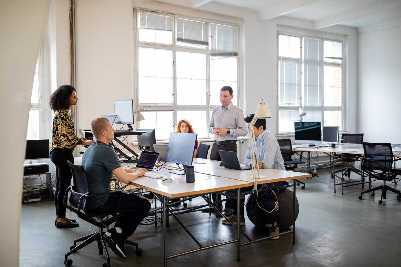 People working in a startup office