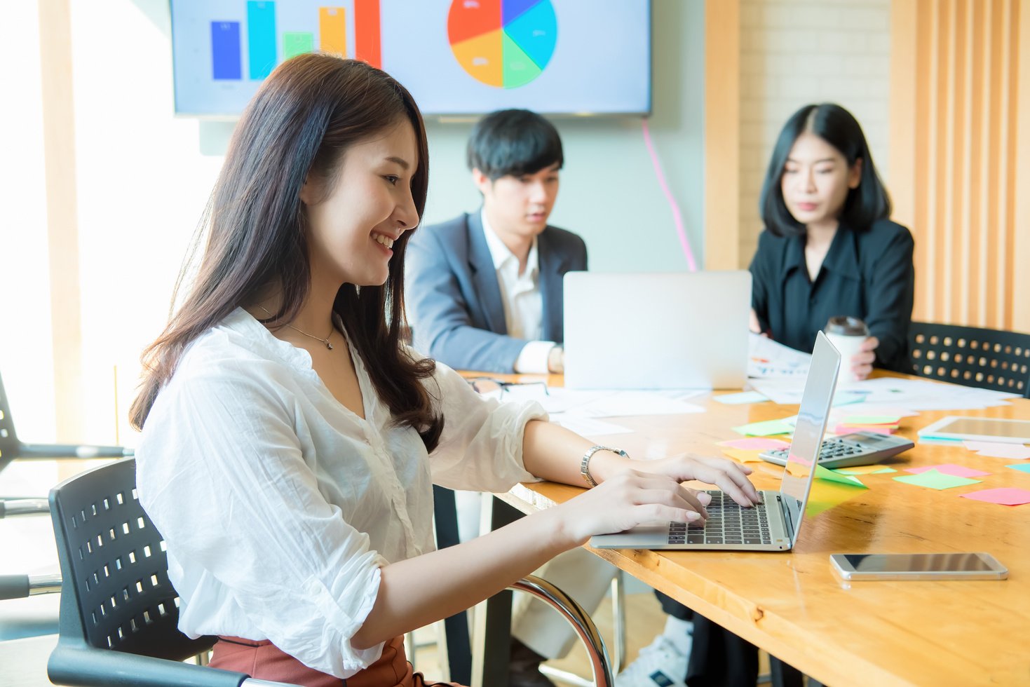 Businesswoman Sitting in a Modern Corporate Envi